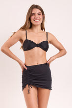 Carica l'immagine nel visualizzatore di Gallery, Model Front: Rio De Sol Jupe De Page Black Mini Skirt Ruched
